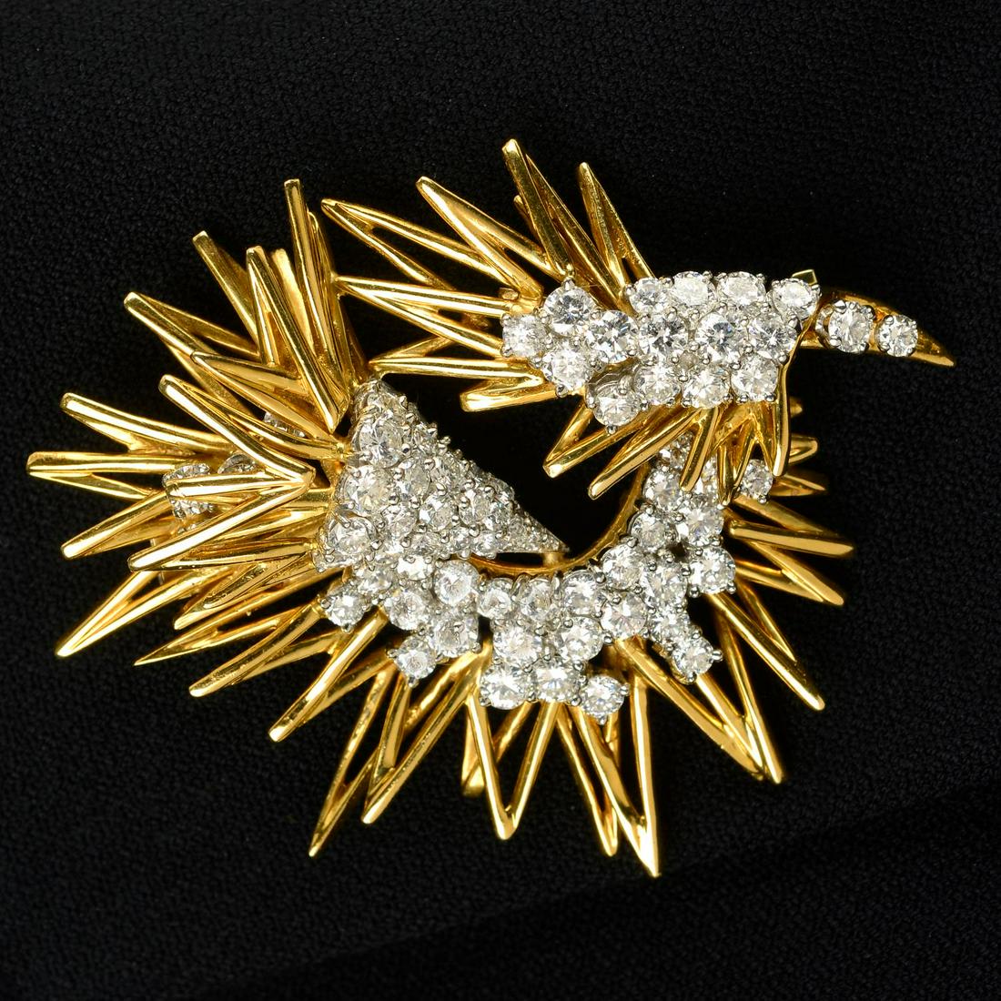 A 1960s 18ct gold pavÃ©-set diamond stylised bird brooch, by Kutchinsky.Estimated total diamond (1 of 4)