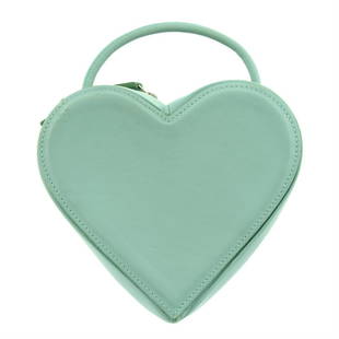 CHRISTOPHER KANE - a mint green leather heart shaped handbag.: CHRISTOPHER KANE - a mint green leather heart shaped handbag. Mint green leather exterior, retractable leather cord shoulder strap, silver-tone hardware, side zip closure with a canvas lined interior.