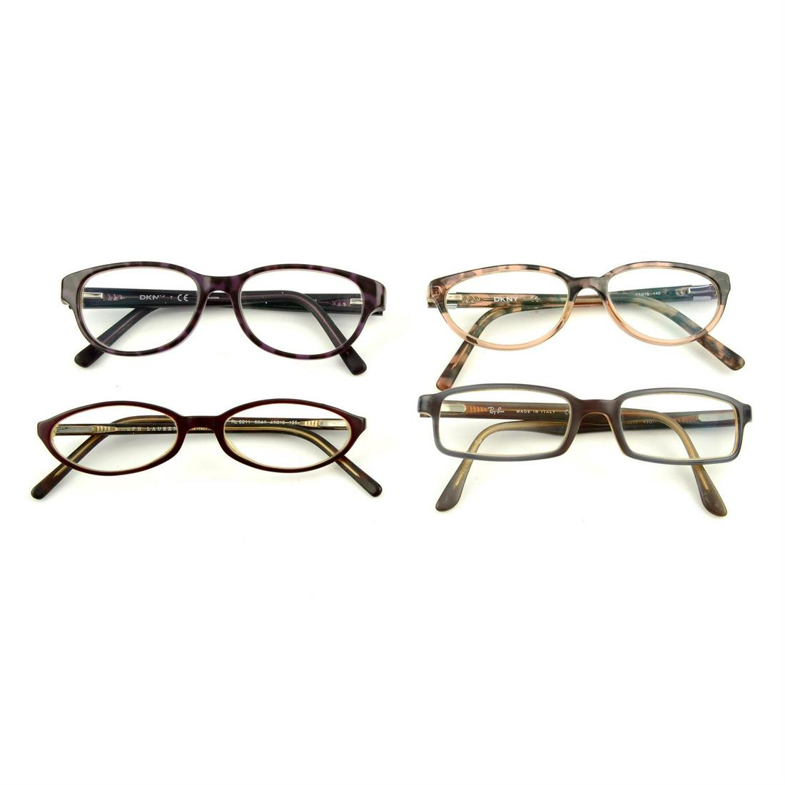 Four pairs of designer prescription glasses.: Four pairs of designer prescription glasses. To include DKNY, Ralph Lauren and Ray Ban examples. With four maker's cases. Condition Report: Glasses are in fair to good condition. However, there are su