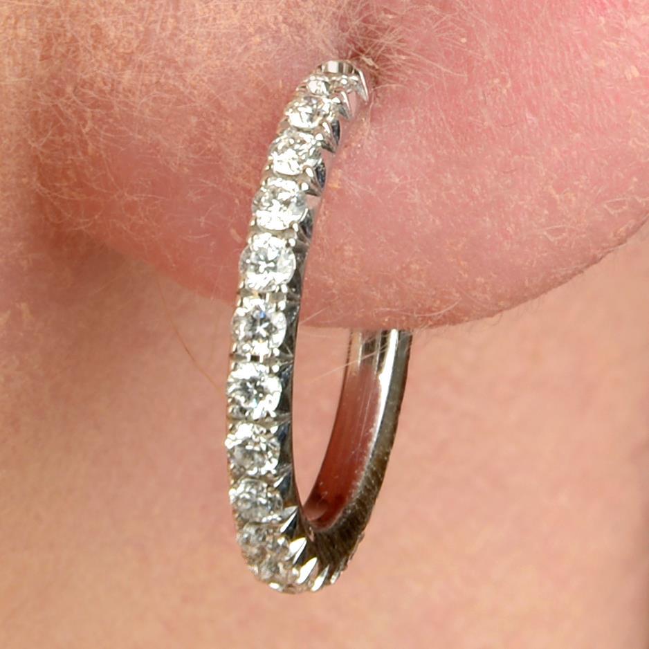 A pair of diamond 'Metro' hoop earrings, by Tiffany & Co. Total diamond weight 0.34ct, estimated G-H (1 of 3)