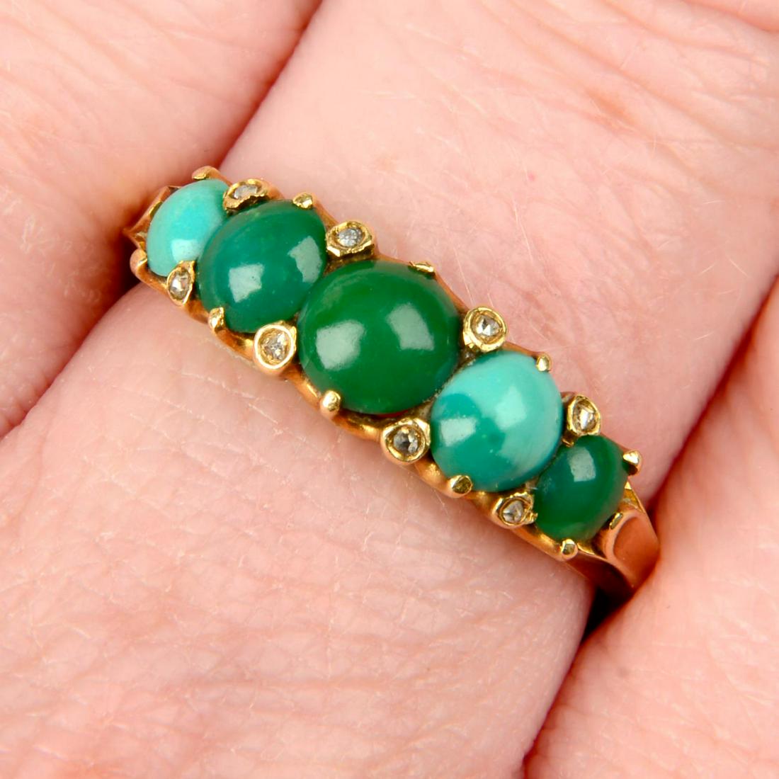 A late Victorian gold graduated turquoise five-stone ring, with diamond point spacers.Ring size (1 of 5)