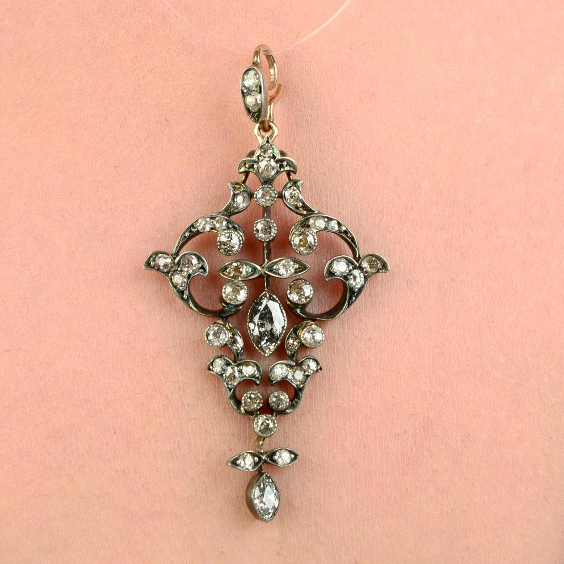 A late 19th century silver and gold old-cut and marquise-shape diamond scrolling foliate (1 of 4)