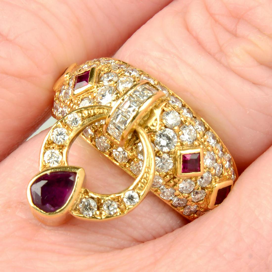 A ruby, sapphire and pavÃ©-set diamond articulated dress ring.Total ruby weight 0.52ct.Sapphire (1 of 5)