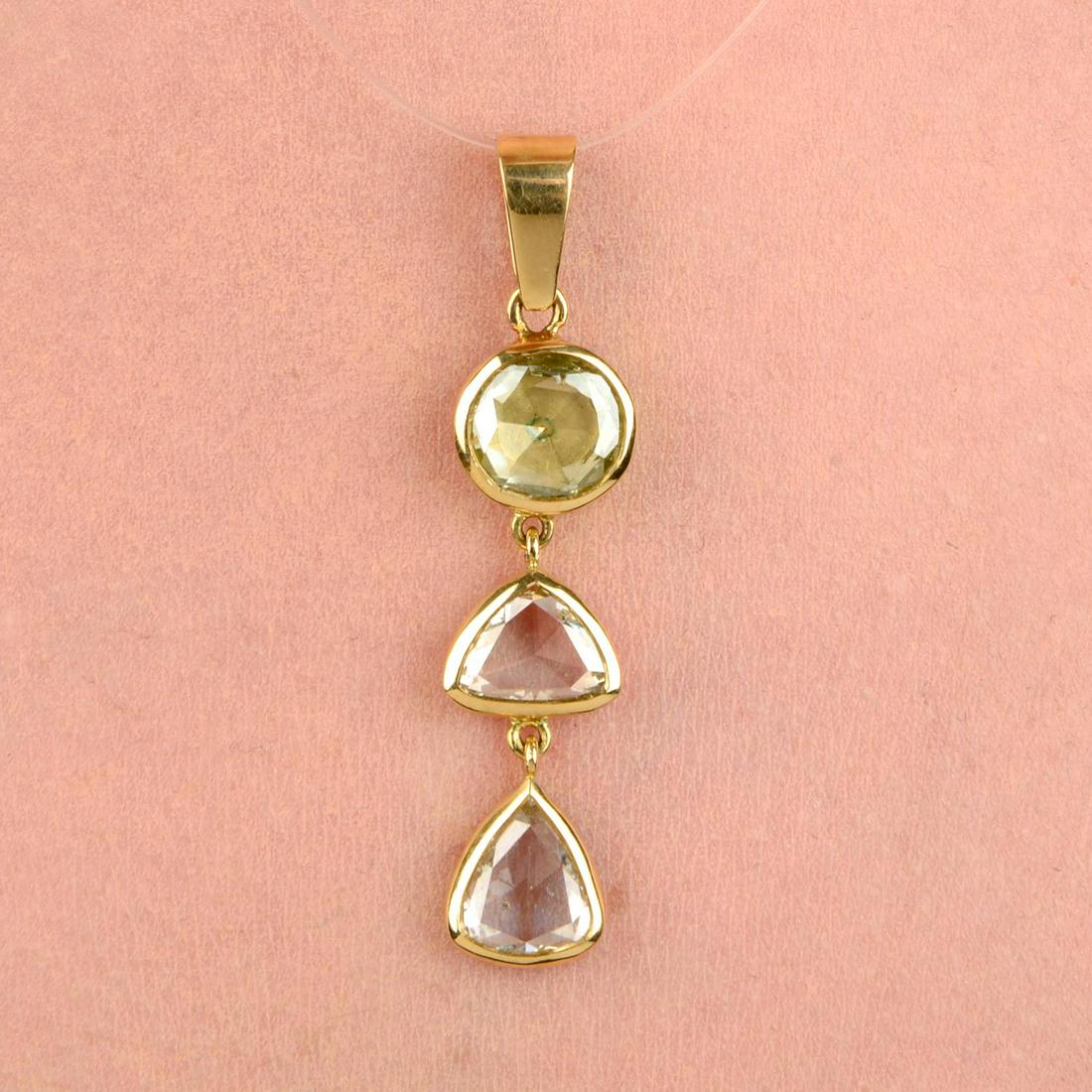 A vari-shape, rose-cut diamond pendant.Estimated dimensions of pear-shape rose-cut diamond at bottom (1 of 4)