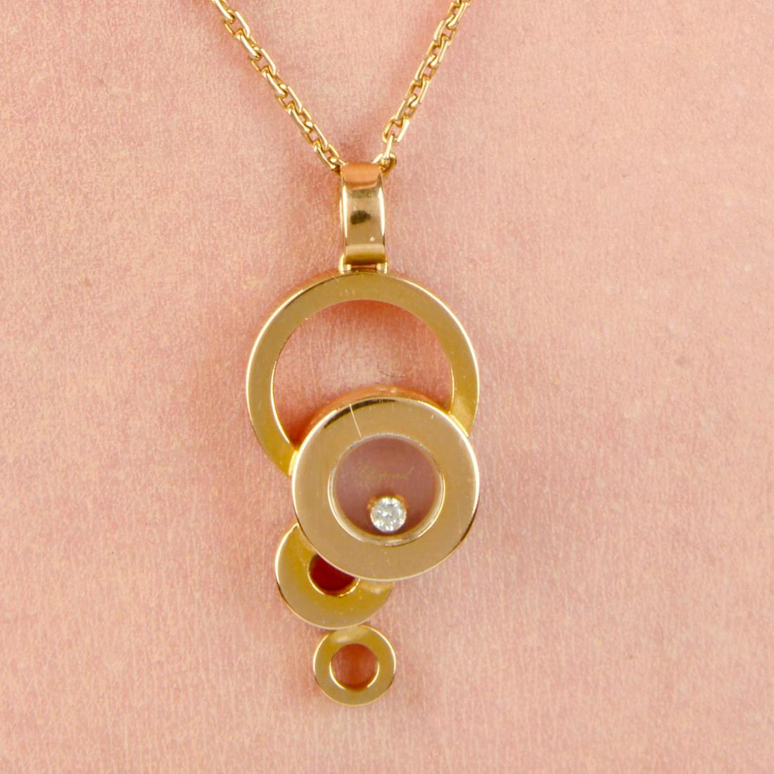 An 18ct gold diamond 'Happy Bubbles' pendant, with chain, by Chopard.Diamond weight 0.03ct.Swiss (1 of 5)