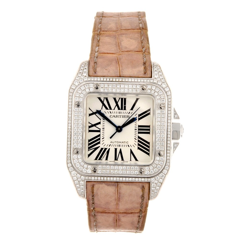An 18k white gold automatic lady's Cartier Santos w: CARTIER - an 18k white gold automatic lady's Santos 100 wrist watch, the silvered dial with hourly applied black Roman numerals, inner minute track, H shaped diamond set case, numbered 111919LX 2881, 