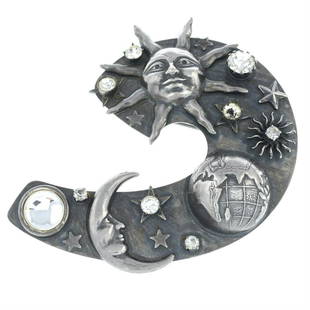 A foil-back paste astrological planet Sun Moon brooch. by Askew London.: A foil-back paste astrological planet Sun Moon brooch. by Askew London. Signed Askew London. Length 9.2cms. 35gms. Condition Report: With general discolouration. One foil-back paste deficien