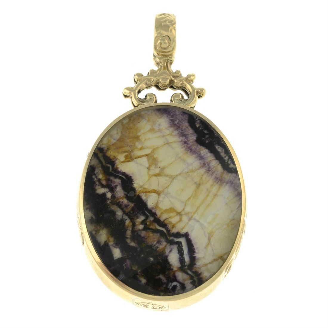 A 9ct gold Blue John and Tiger's-eye reversible pendant, by David Scott Walker.: A 9ct gold Blue John and Tiger's-eye reversible pendant, by David Scott Walker. Hallmarks for Sheffield, 1996. Length 5.4cms. 28.3gms. Condition Report: Some light surface scratches/ wear. With maker'