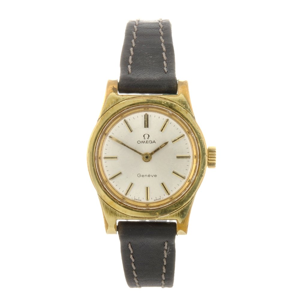 A gold plated lady's Omega Geneve wrist watch.: OMEGA - a gold plated quartz lady's wrist watch, the silvered dial with hourly applied batons, bordered by a minute track, tonneau shaped case fitted to an associated black leather strap with pin buck