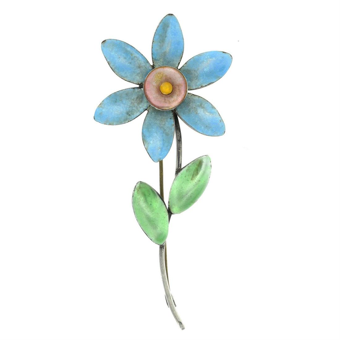 An Arts and Crafts silver and enamel flower brooch, by Bernard Instone.: An Arts and Crafts silver and enamel flower brooch, by Bernard Instone. Maker's marks for Bernard Instone. Stamped SILVER. Length 7cms. 8.2gms. Cond