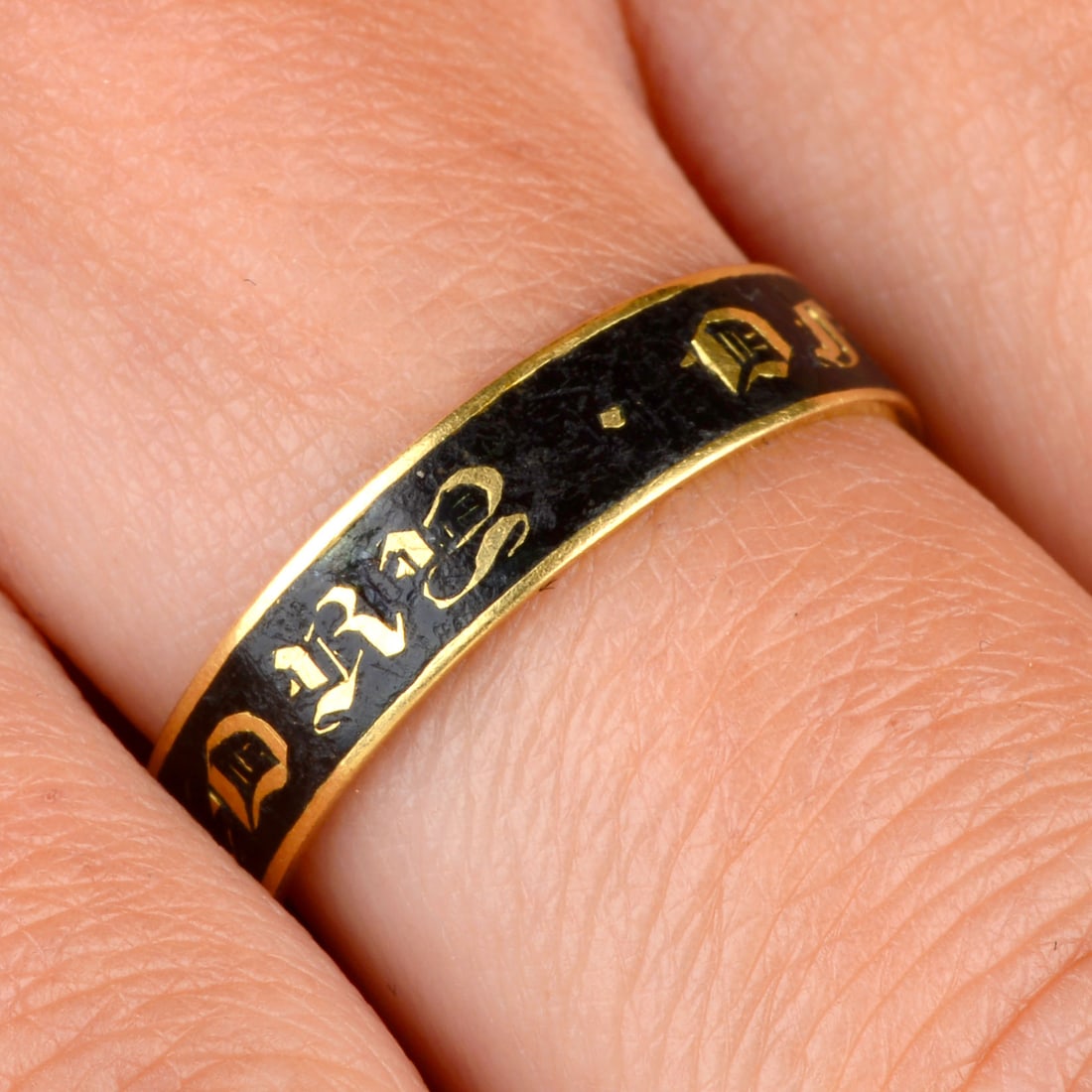 A Georgian 18ct gold black enamel 'In Memory Of' band ring, engraved 'Capt'n John Thomas Ob't 1 July (1 of 7)