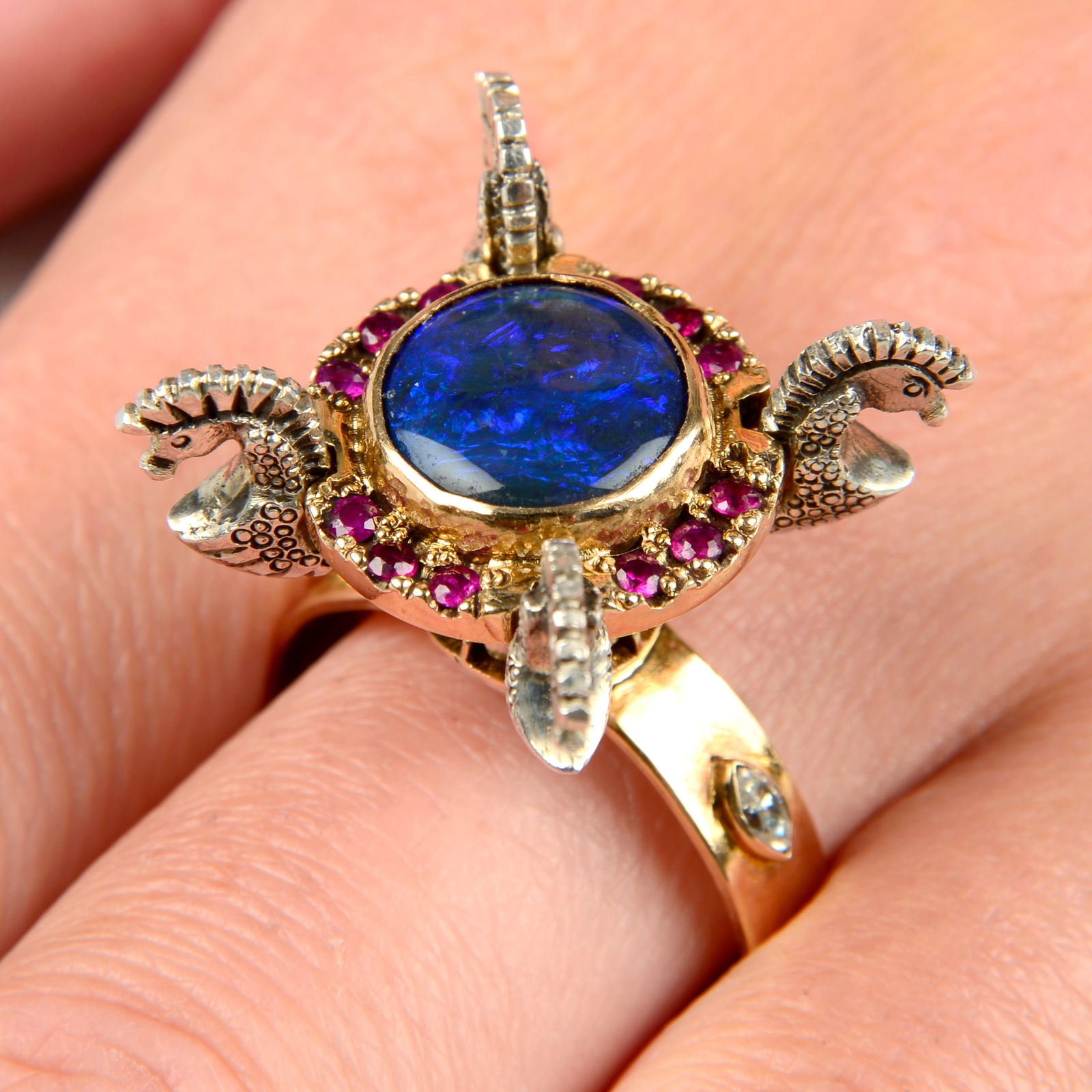 A black opal, ruby, green garnet and marquise-shape diamond dress ring, with seahorse supports. (1 of 8)