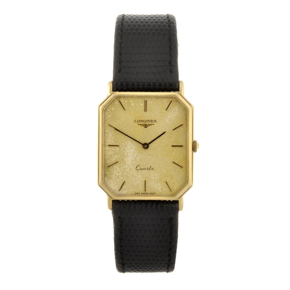 (924000944) An 18k gold quartz gentleman's Longine: (924000944) LONGINES - an 18k gold quartz gentleman's wrist watch, the champagne tone dial with hourly applied batons, rectangular shaped case with cut corners, fitted to a non-original black leather
