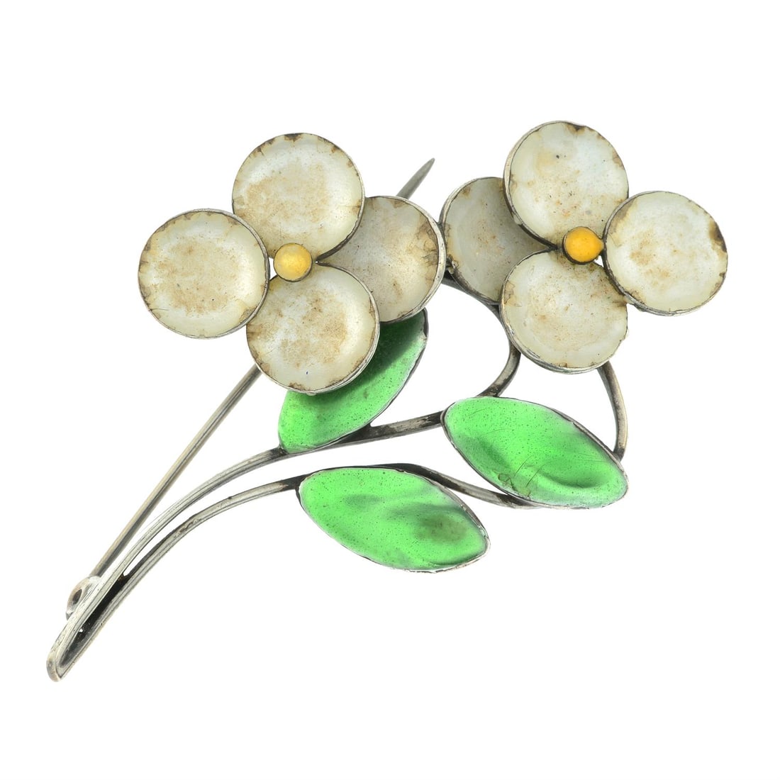 An Arts and Crafts silver and enamel flower brooch, by Bernard Instone.: An Arts and Crafts silver and enamel flower brooch, by Bernard Instone. Stamped STERLING SILVER. Length 6cms. 10.6gms. Condition Report: General light marks, wear and discolouration to metal.