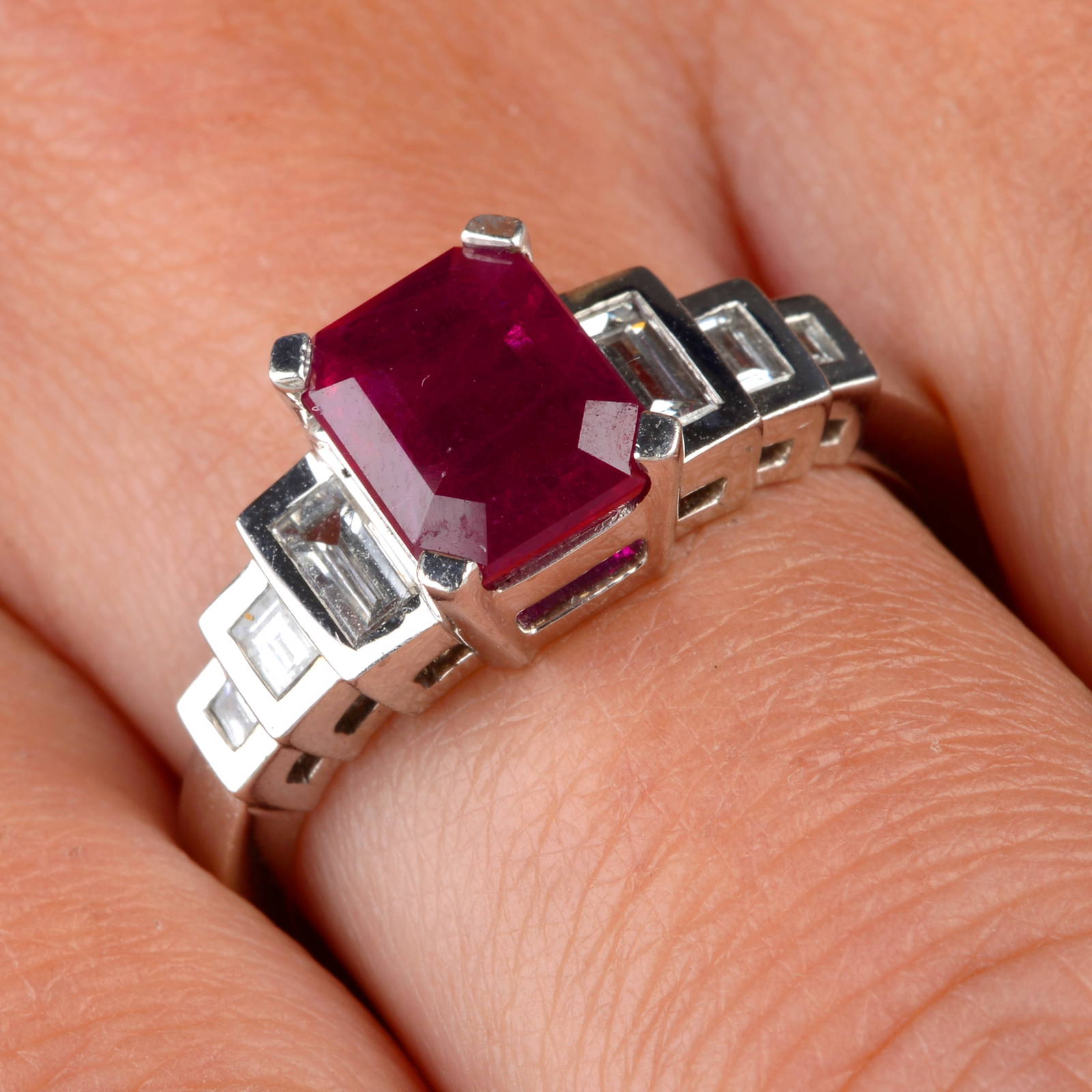 An 18ct Gold Ruby Ring, With Graduated Baguette-cut Diamond Shoulders ...