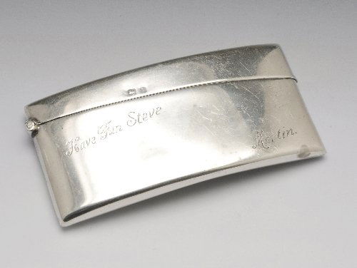 Small early twentieth century silver card case.: Early twentieth century silver card case of plain curved rectangular form and personal inscription. Hallmarked Birmingham, possibly 1910. Length measuring 8.2 cm, weight (39 grams).