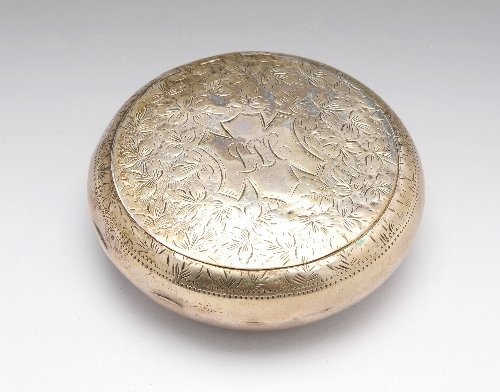 Edwardian silver pebble snuff box.: An Edwardian silver pebble snuff box of circular form with foliate engraved surround to the initialled cartouche, personal date engraving to the underside of the lid 11.4.19. Hallmarked Walker & Hall 