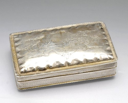 A Dutch silver snuff box.: A Dutch silver snuff box of oblong form with reeded edge, shaped rim and engraved with a primitive pastoral scene. Hallmarked with the Lion passant, Minerva head and AD83. Length measuring 7.7 cm, wei
