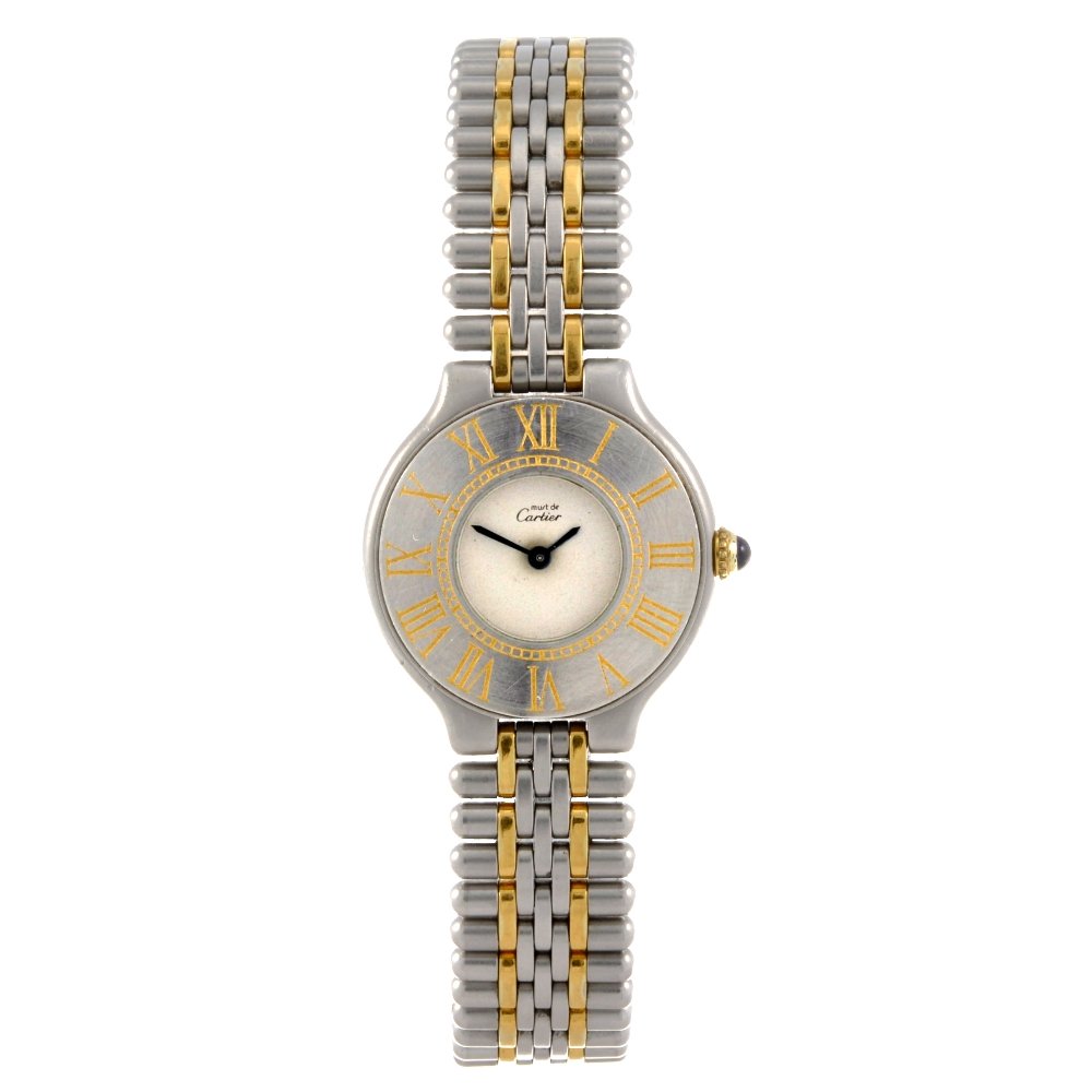 A bi-colour quartz lady's Cartier Must de Cartier b: CARTIER - a bi-colour quartz lady's Must De Cartier 21 bracelet watch, plain silvered dial, Roman numeral chapter ring bezel, tonneau shaped case numbered 901036551, fitted to a bi-colour link bracele
