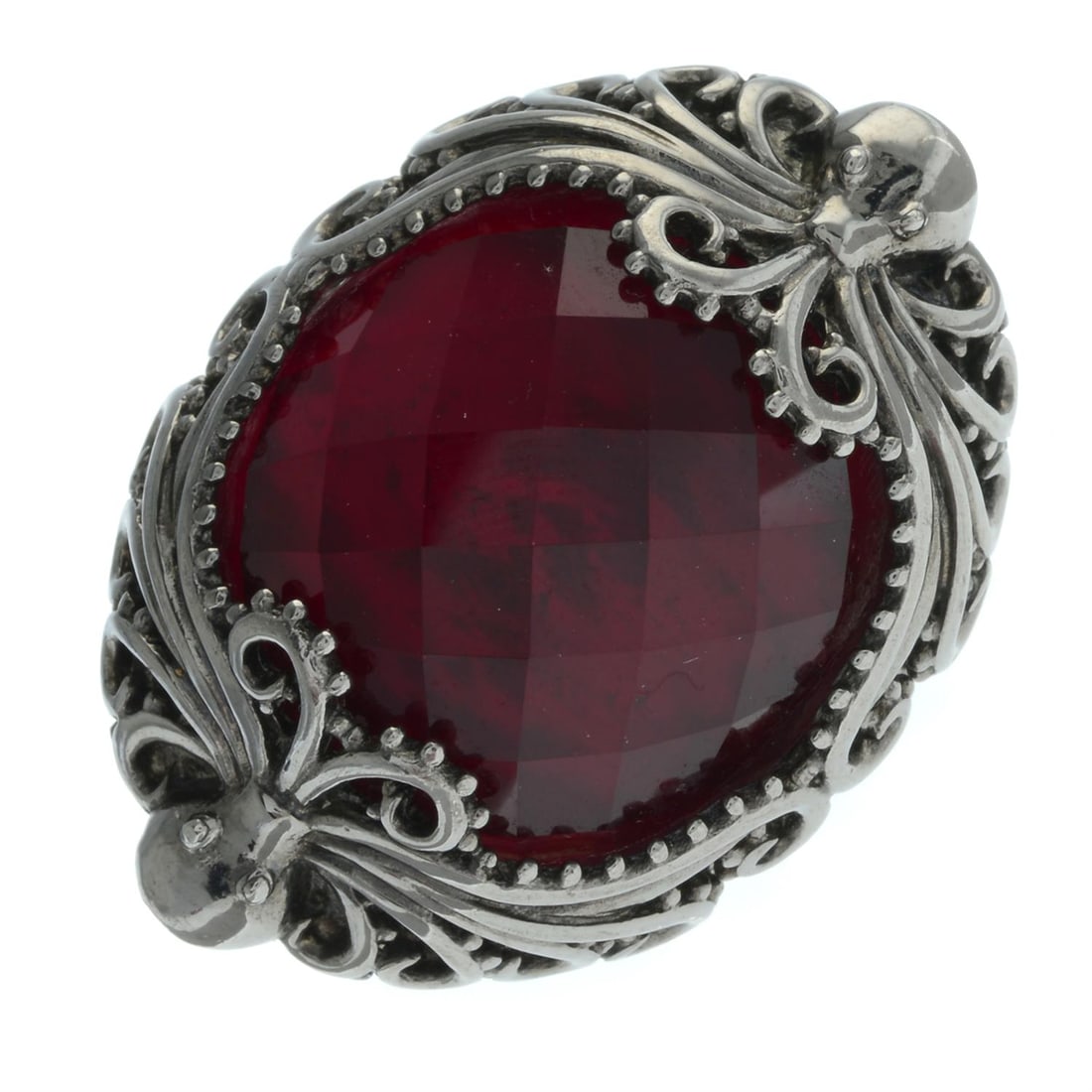 Silver Red paste dress ring, by Stephen Webster: A silver red paste dress ring, by Stephen Webster. Hallmarks for Sheffield. Ring size L. 22gms. Condition Report: Minor abrasion to band. Makers mark for Stephen Webster. Paste with minor abras