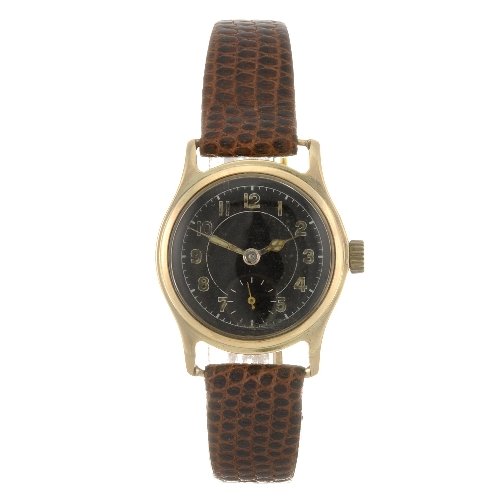 A 9ct gold manual wind Zenith wrist watch with a l: ZENITH - a 9ct gold manual wind wrist watch, the black dial with hourly applied luminous Arabic numerals, bordered by a minute track, subsidiary seconds dial to six o'clock, tonneau shaped case with i