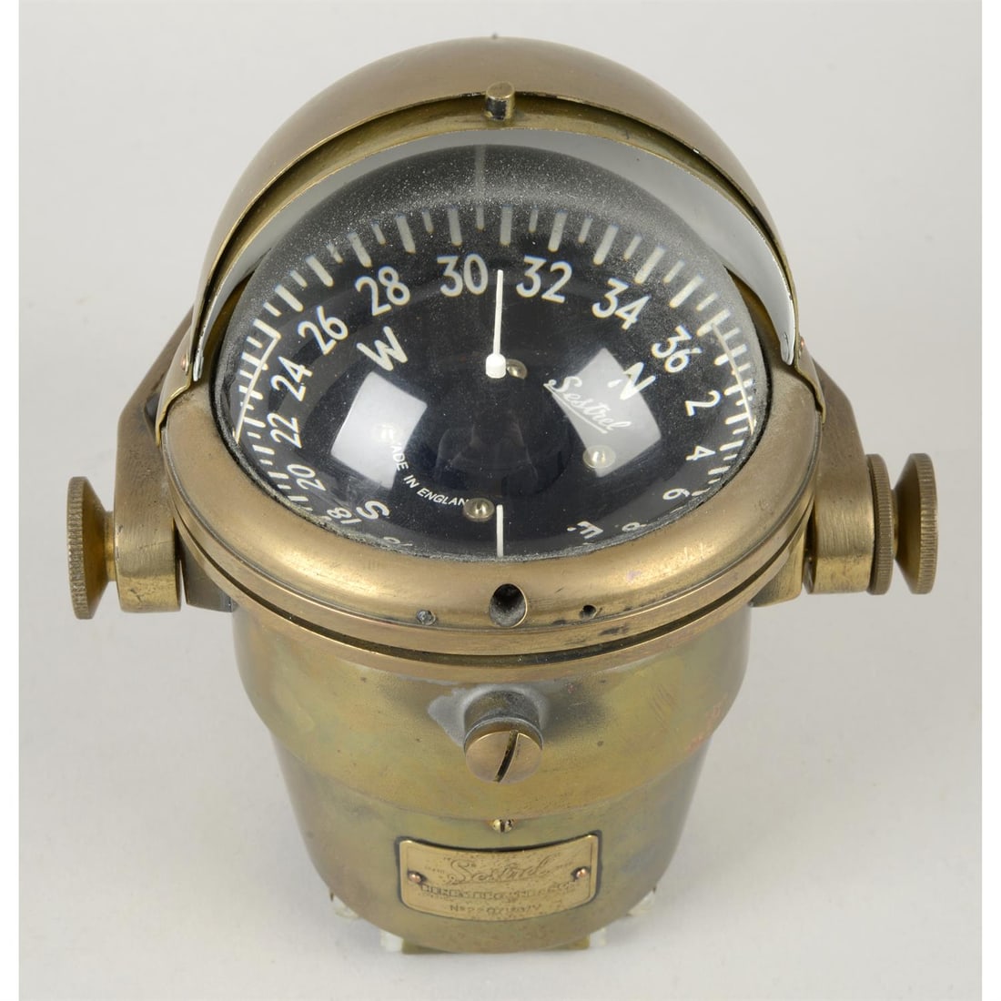 Henry Brown & Son Sestrel Compass.: A vintage brass Henry Browne & Son Sestrel ship's compass, No. 22071/V. Height 17cm. Condition Report: Some pitting and scuffs to the brass Some tarnish marks Some scratching and discolouration in pla