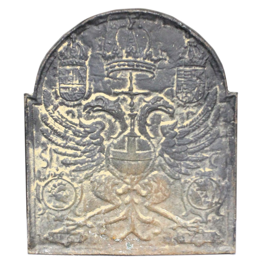 Two cast iron firebacks: Two cast iron firebacks both with the Royal coat of arms in low relief, 75cm x 63.5cm and 70cm x 54cm (2) Condition Report: Both later 20th century examples Both with scuffs and marks Both with aged m