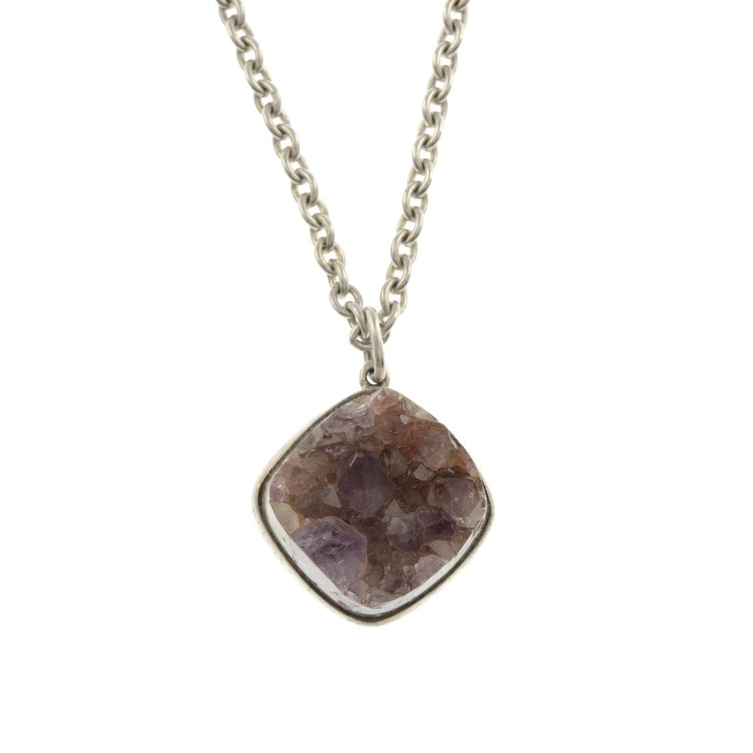 Amethyst geode pendant, with chain, by Bent Knudsen.: An amethyst geode pendant, with chain, by Bent Knudsen. Signed Bent K. Stamped Sterling. Pendant length 3.8cm. Chain length 57.7cm. 46.5gm. Condition Report: Surface scratches/ wear, discolouration an