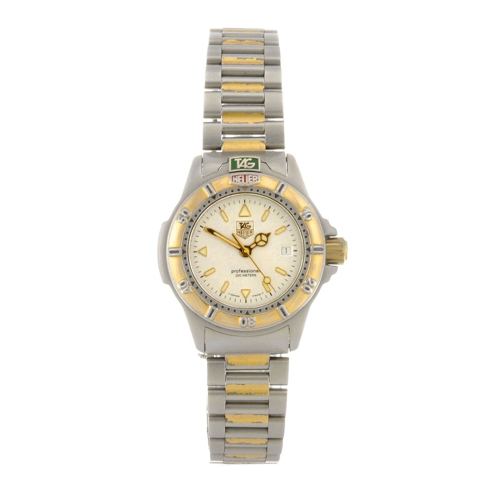 A bi-colour quartz lady's Tag Heuer 4000 Series br: TAG HEUER - a bi-colour quartz lady's Tag Heuer 4000 Series bracelet watch, the silvered dial with hourly applied luminous markers, bordered by a minute track, date aperture to three o'clock, unidirec