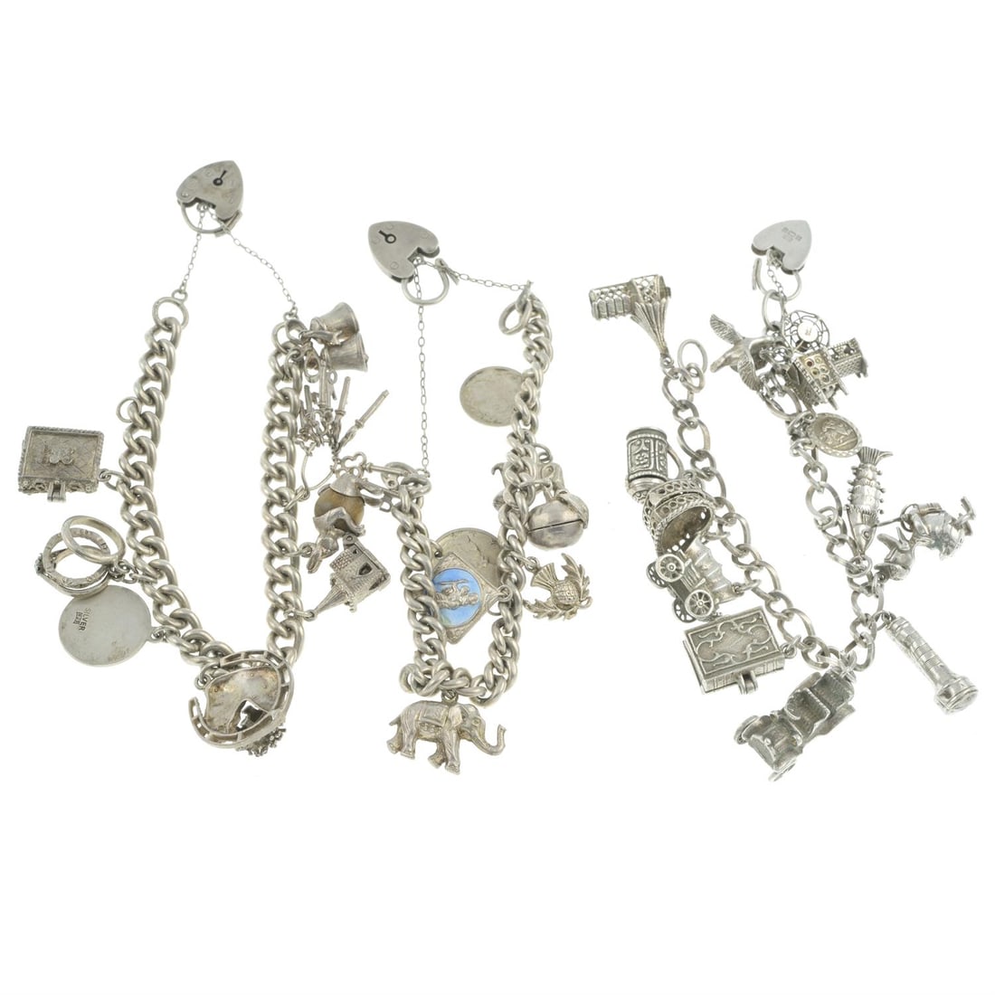 Three charm bracelets: Three silver charm bracelets. Two bracelets hallmarks for Birmingham and one for London. Length 16 to 19.5cm. Total weight 159.7gm. Condition Report: Overall condition fair. Surface scratches/ wear, m