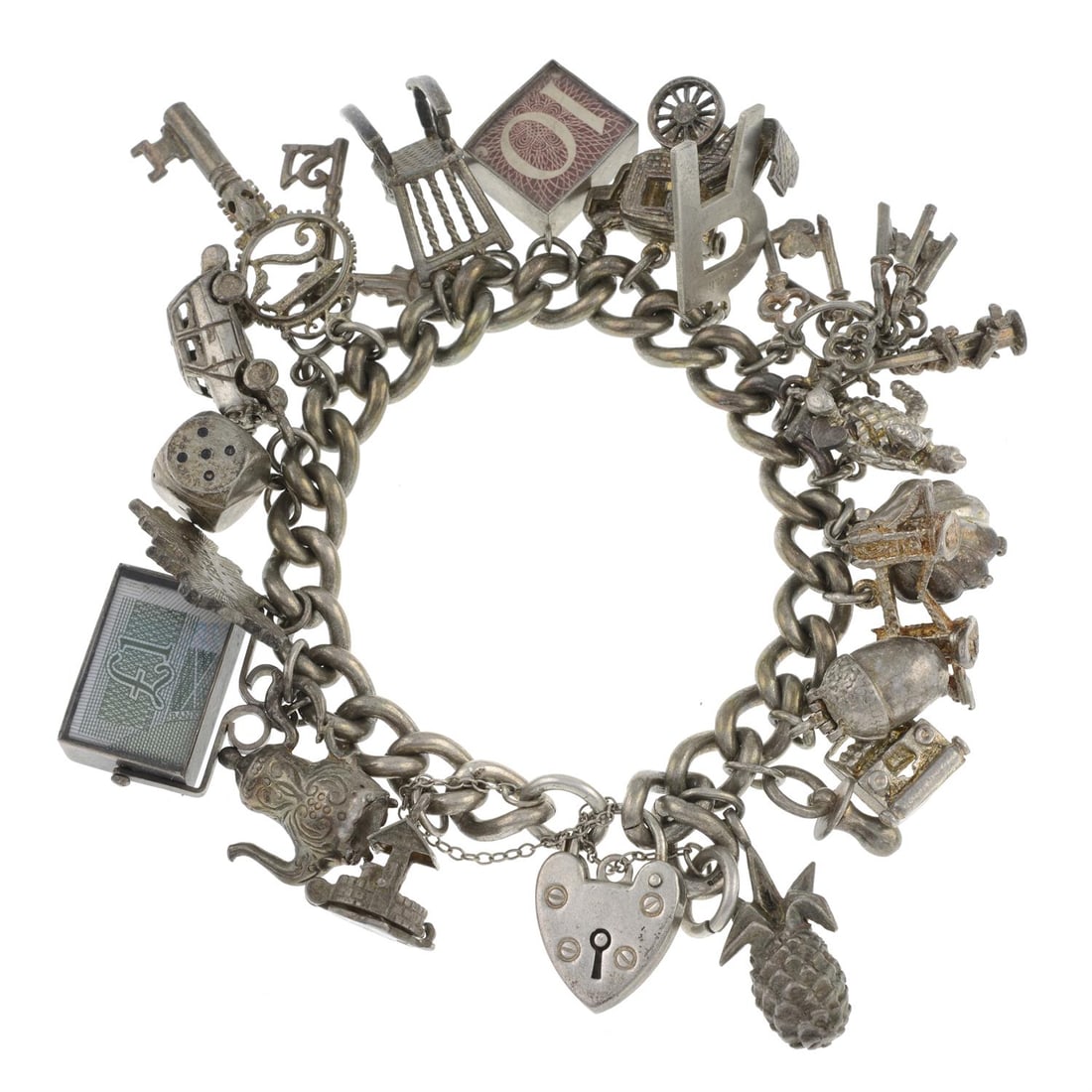 Silver charm bracelets, suspending variously deigned charms.: A silver charm bracelets, suspending variously deigned charms. Clasp with hallmark for Sheffield, 1977. Some charms with marks for silver. Bracelet length 16cm. Charm length 3.8 to 2cm. 96gm. C