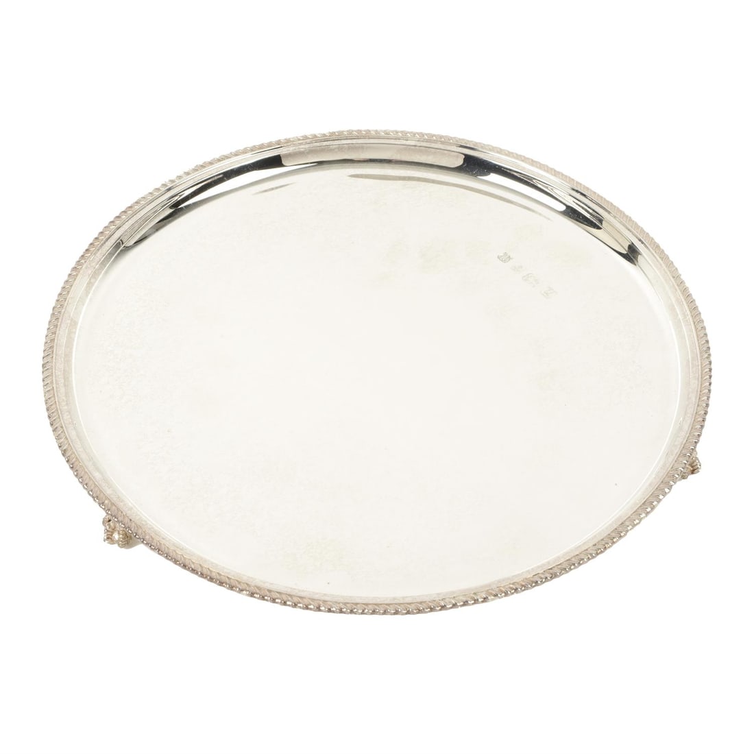 Modern silver salver on claw and ball feet, in fitted case.: A modern silver salver on claw and ball feet, with rope rim surrounding plain central plate and initial engraving to base. Hallmarked Barker Ellis Silver Co, Birmingham 1994. Diameter 26cm, weight 15.