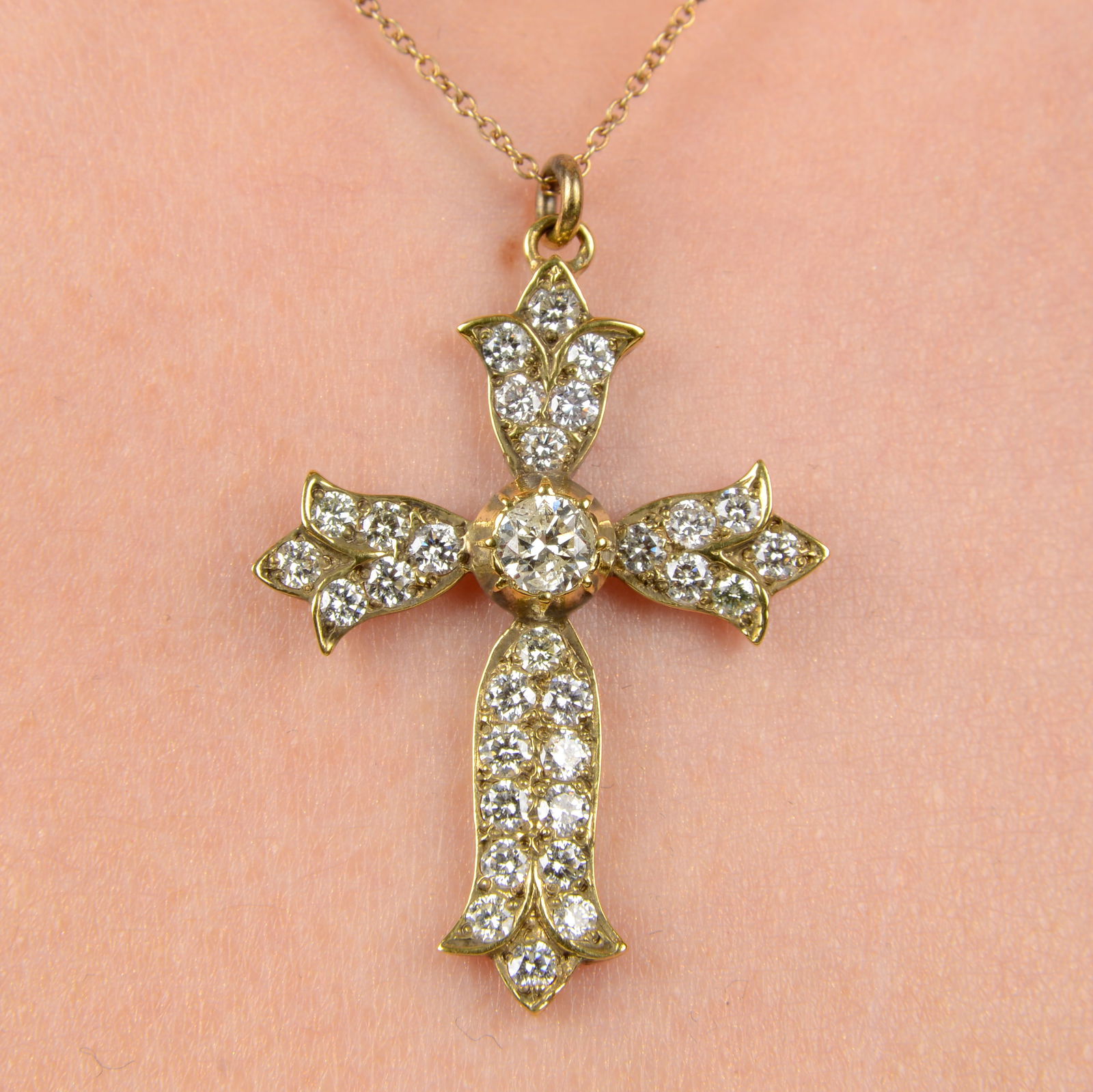 A brilliant-cut diamond cross pendant, with chain.Total diamond weight 1.50cts, estimated H-K (1 of 5)