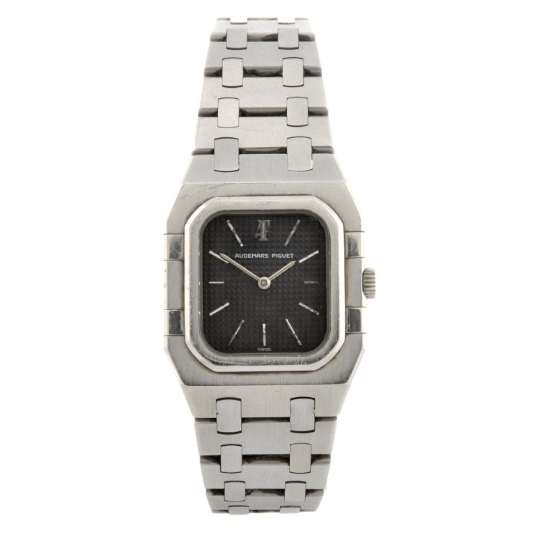 A stainless steel quartz Audemars Piguet bracelet wa: AUDEMARS PIGUET - a stainless steel quartz lady's bracelet watch, the black dial with silvered baton hour markers, octagonal shaped case, numbered B68978, fitted to an integral steel link bracelet wit