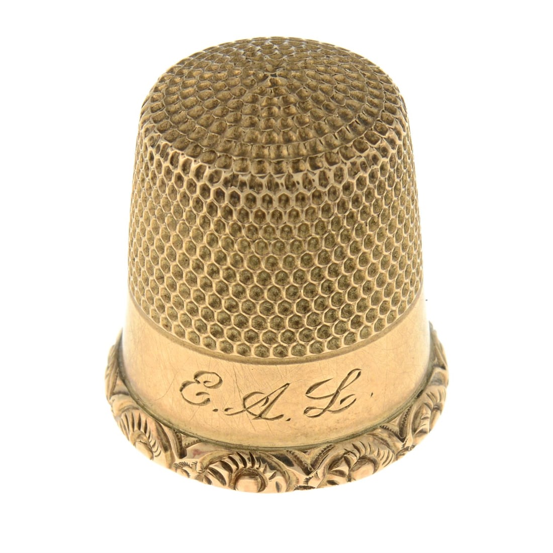 Early 20th century gold Thimble: An early 20th century gold Thimble. Length 1.8cms. 3.7gms. Condition Report: Surface scratches/wear and discolouration. Engraved 'E.A.L'