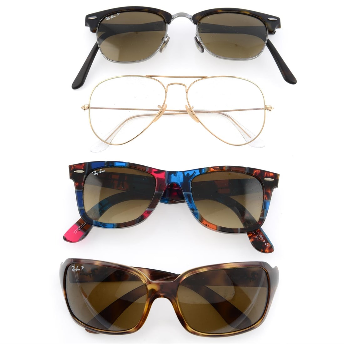 Ray-Ban - three pairs of sunglasses and one pair of glasses.: Ray Ban - three pairs of sunglasses and one pair of glasses. Includes four maker's cases. Condition Report: Fair condition. Some scuffing along lenses and arms. One pair are foldable glasses.