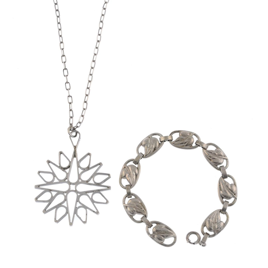 Mid 20th century bracelet & necklace: A mid 20th century silver leaf bracelet, by Danecraft, with maker's mark, stamped STERLING, length 18cms, 16.3gms. A mid 20th century silver openwork pendant, by Jack Spencer, suspended from an u