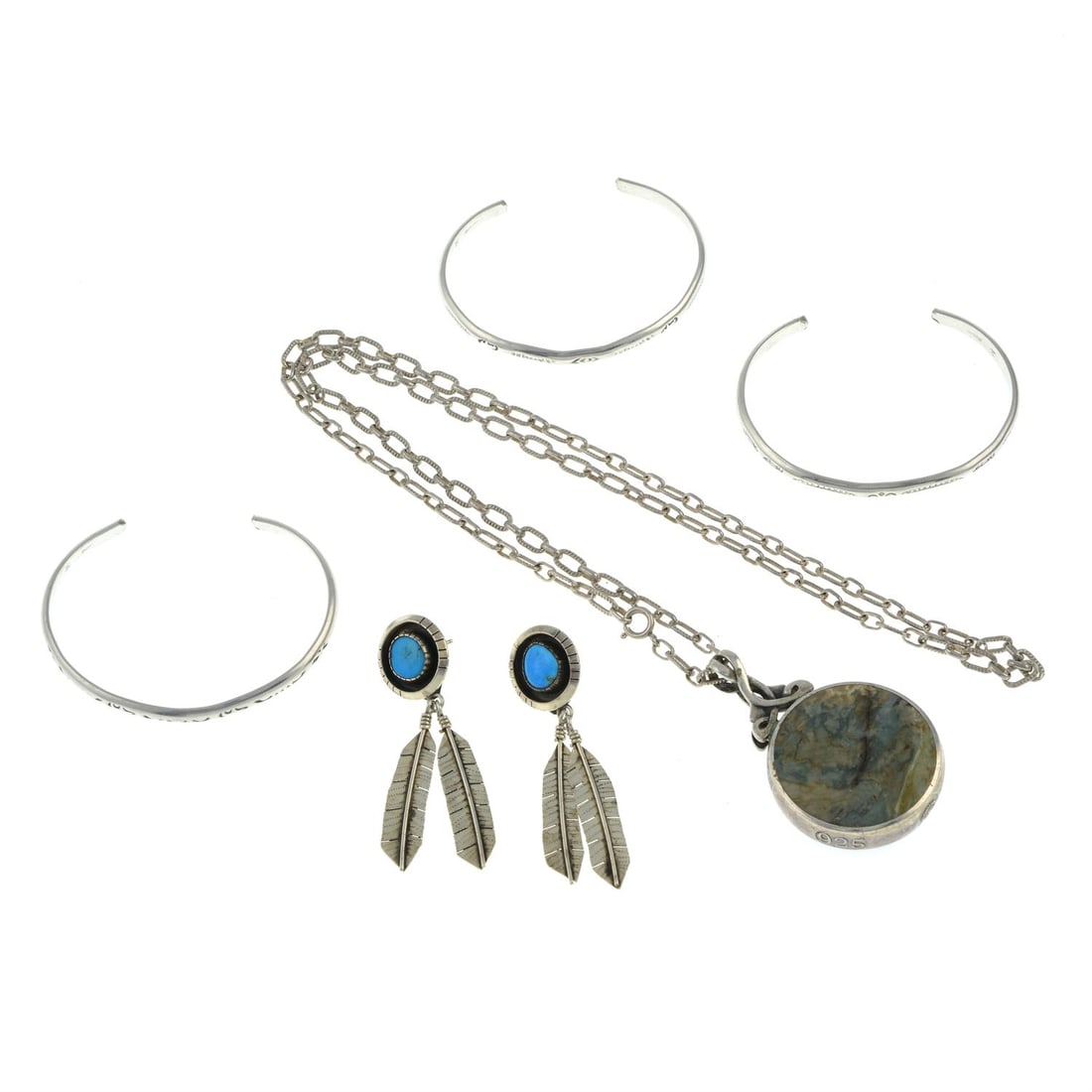 Assorted jewellery, some by Arnold Maloney & David Scott Walker: Three cuff bangles, by Arnold Maloney, makers marks for Arnold Maloney, inner diameter of one 5.9cm, 25.1gm. A gem-set double-sided pendant, with chain by David Scott Walker, makers marks for David Sc