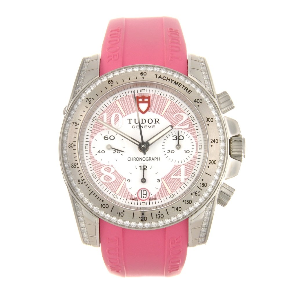 (76401) (14) A stainless steel automatic Tudor Lad: (76401) TUDOR - a stainless steel automatic chronograph Lady Chrono wrist watch, the white dial, hourly applied Arabic numerals interspaced with markers within a pink band, bordered by a minute track,