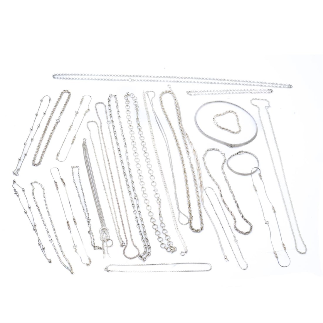 Selection of silver chains & bracelets: A selection of silver chains and silver bracelets. Some chains with imported marks for London and some stamped 925. Total weight 535.9gms. Condition Report: