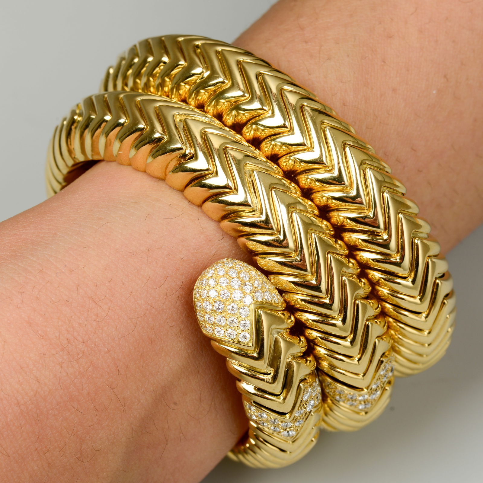A diamond 'Spiga' bracelet, by Bulgari. Estimated total diamond weight 2.15cts, G-H colour, VS (1 of 4)