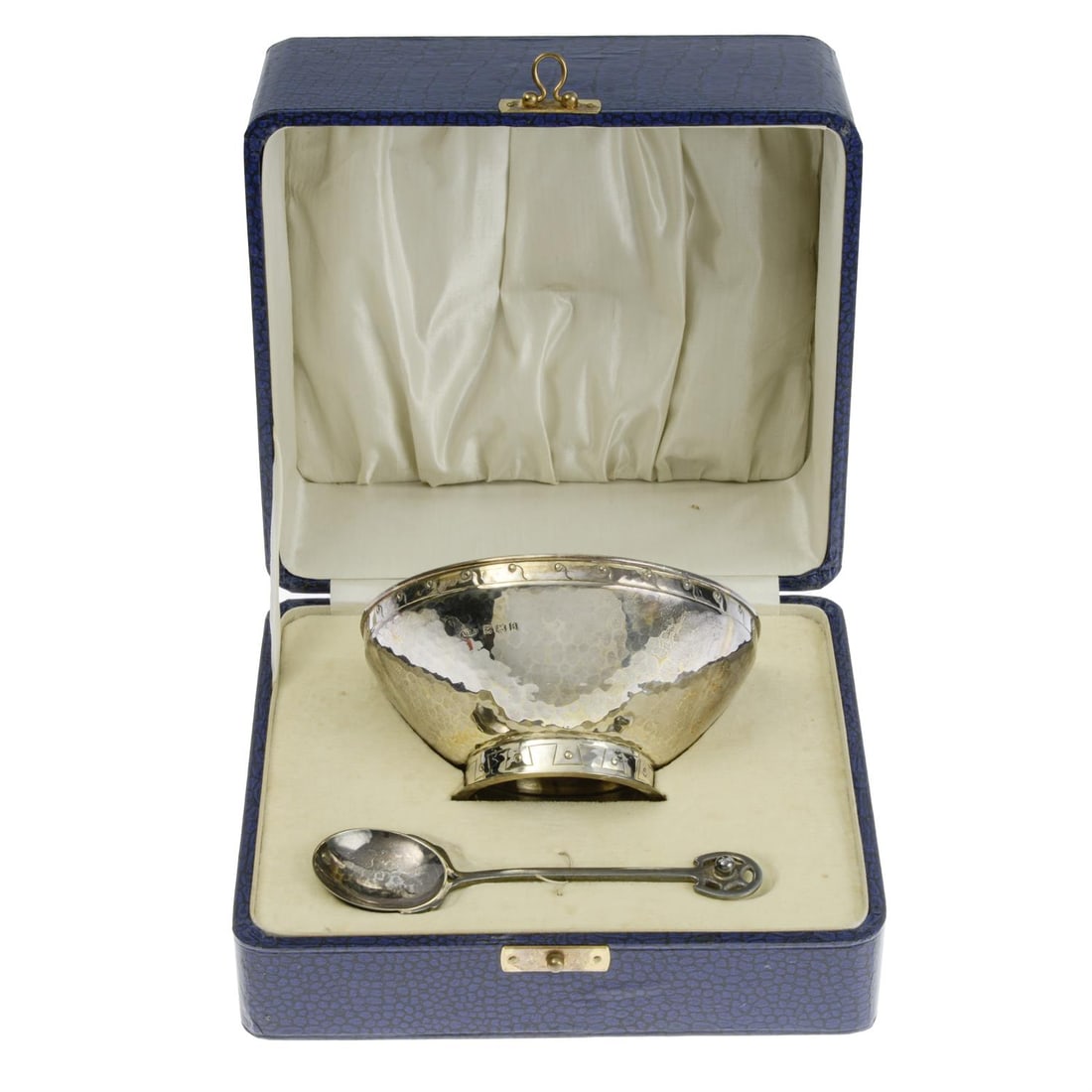 Arts & Crafts style hammered silver bowl and spoon, in fitted case.: A 1920's silver bowl and spoon in the Art and Crafts style, the conical bowl with planishing and dot border, the spoon with a planished bowl and shaped terminal. Hallmarked A.E Jones, Birmingham 1926.