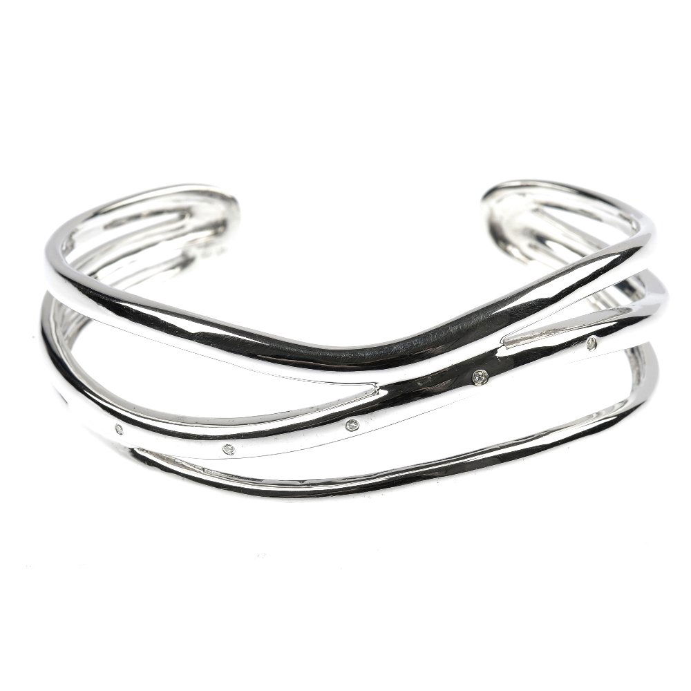 Thirty-six items of designer jewellery and two fur: * Thirty-six items of designer jewellery, to include White Fire, DKNY and Guess pieces, together with a set of Lalique miniatures gentlemen's eau de parfum bottles and a Royal Selangor pewter ornament