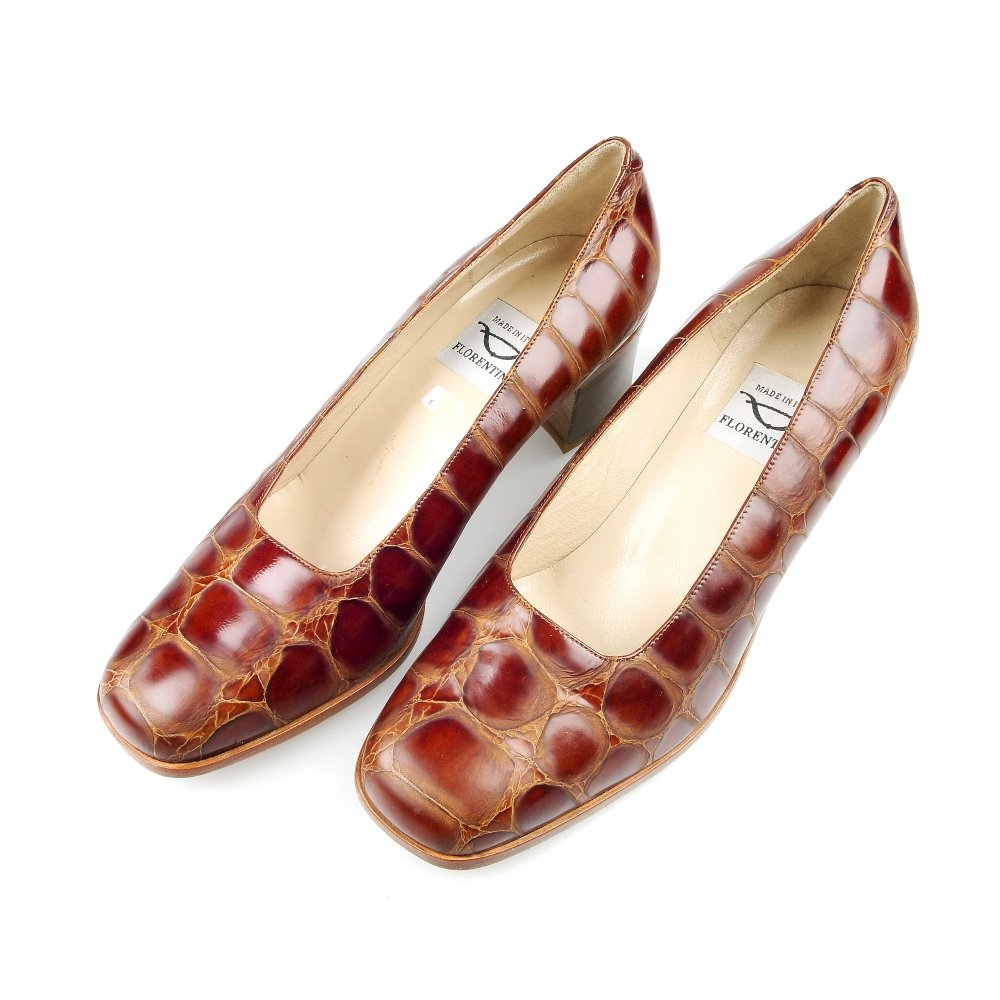 A pair of Italian crocodile skin court shoes.: FLORENTINE - a pair of Italian court shoes, made of brown crocodile skin upper and leather soles with a mid size heel. Size 38.5.