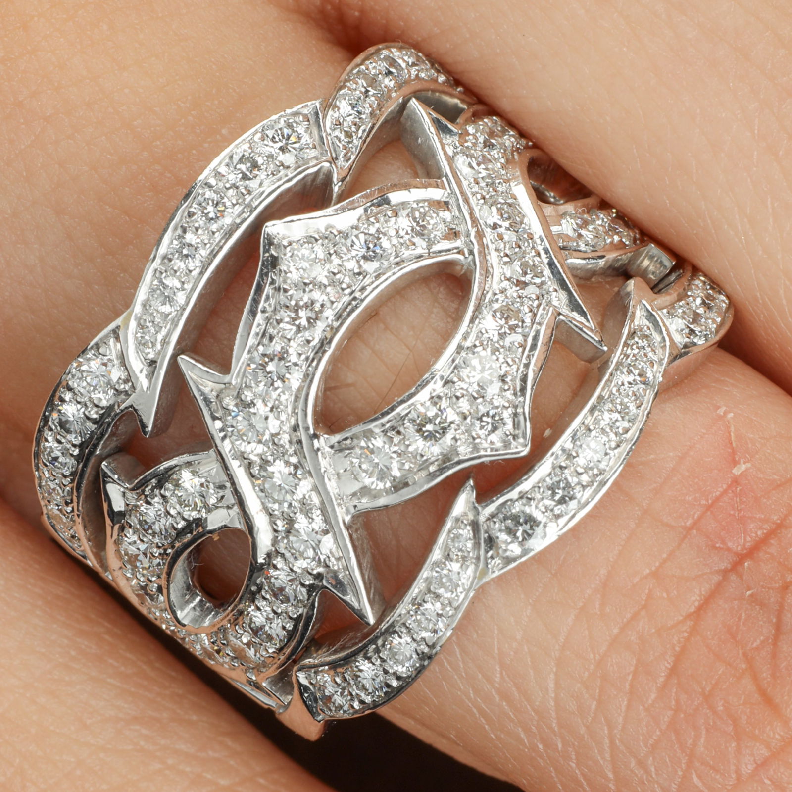 Gold diamond 'Tattoo' ring, by Stephen Webster: An 18ct gold diamond 'Tattoo' ring, by Stephen Webster. Estimated total diamond weight 1ct, G-I colour, VS clarity. Hallmarks for London, 2002, indistinct. Ring size M1/2. 12.2gms.