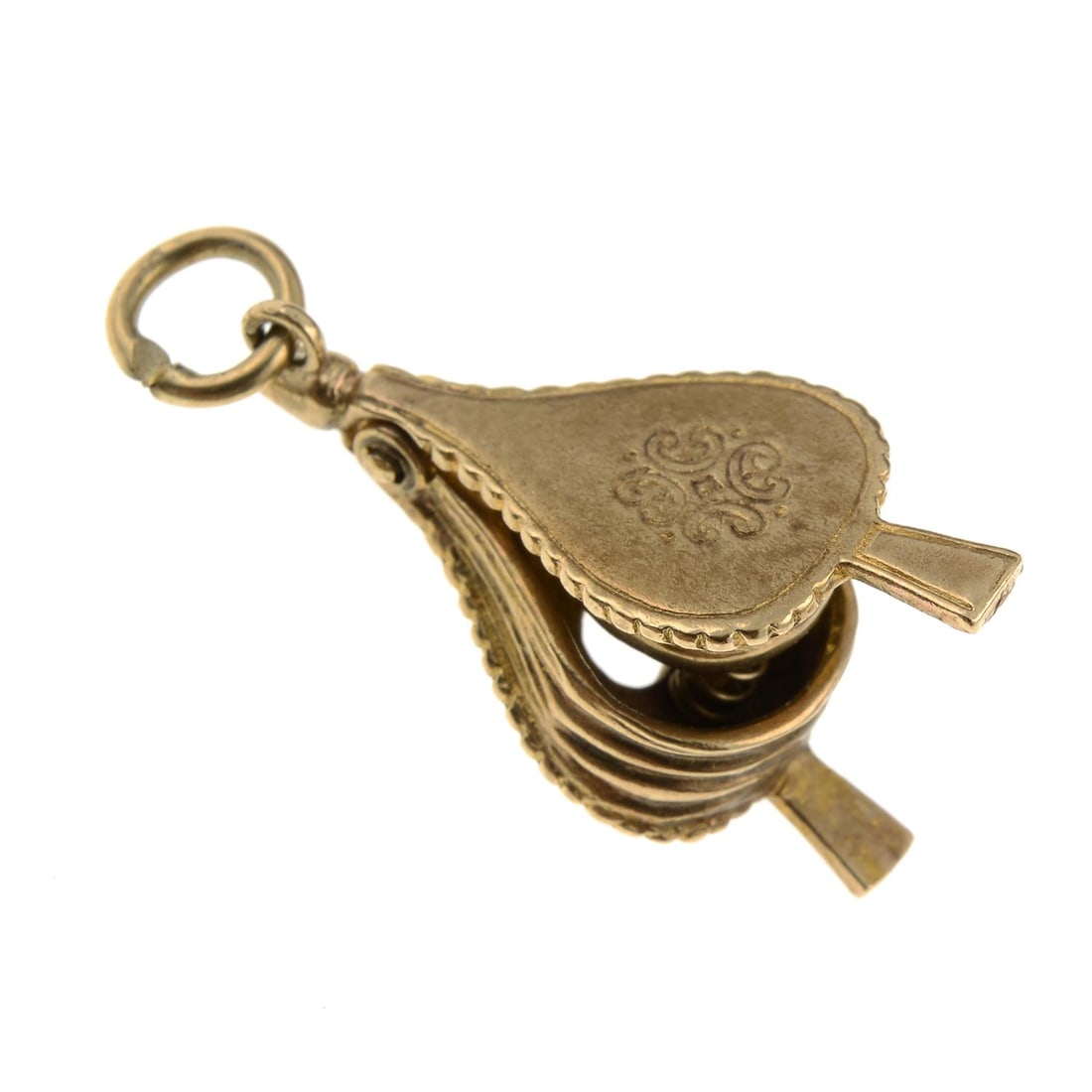 9ct gold bellows charm: A 9ct gold articulated bellows charm. Hallmark for Birmingham, 1968. Length 2.6gms. 3gms. Condition Report:Some surface abrasions and minor surface discolour