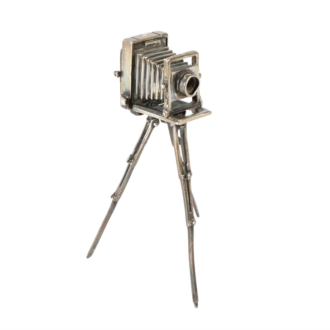 Novelty silver miniature camera with tripod.: A novelty silver miniature toy, modelled as an antique bellows/plate camera on a swivel tripod stand. Hallmarked S M C, London import 1980. Approximate height upright 8.5cm, gross weight 34g. Conditio
