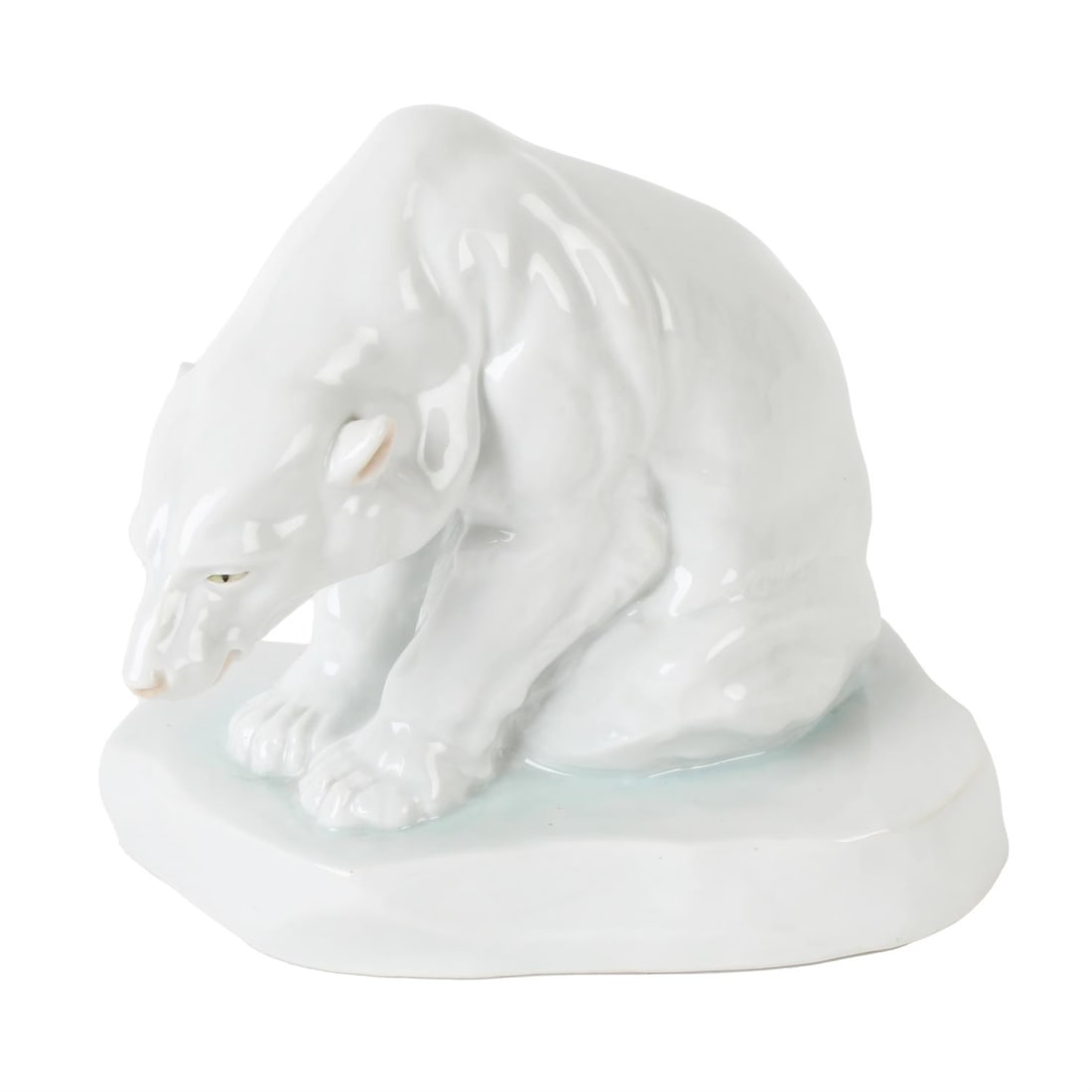 Herend model of a Polar Bear designed by Bela Markup: A large Herend model of a seated polar bear upon an ice glacier, designed by Bela Markup, printed mark alongside impressed mark, incised Markup Bela 1927, to the reverse, height 20cm Condition Report: