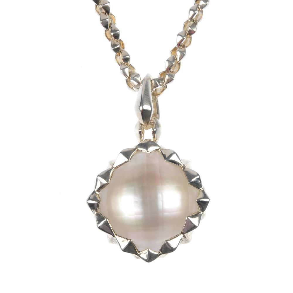 STEPHEN WEBSTER - a silver gem-set 'Superstud' pen: * STEPHEN WEBSTER - a silver gem-set 'Superstud' pendant. The mother-of-pearl and quartz composite gem, within a stud surround, suspended from a similarly-designed surmount and chain. Maker's mark for