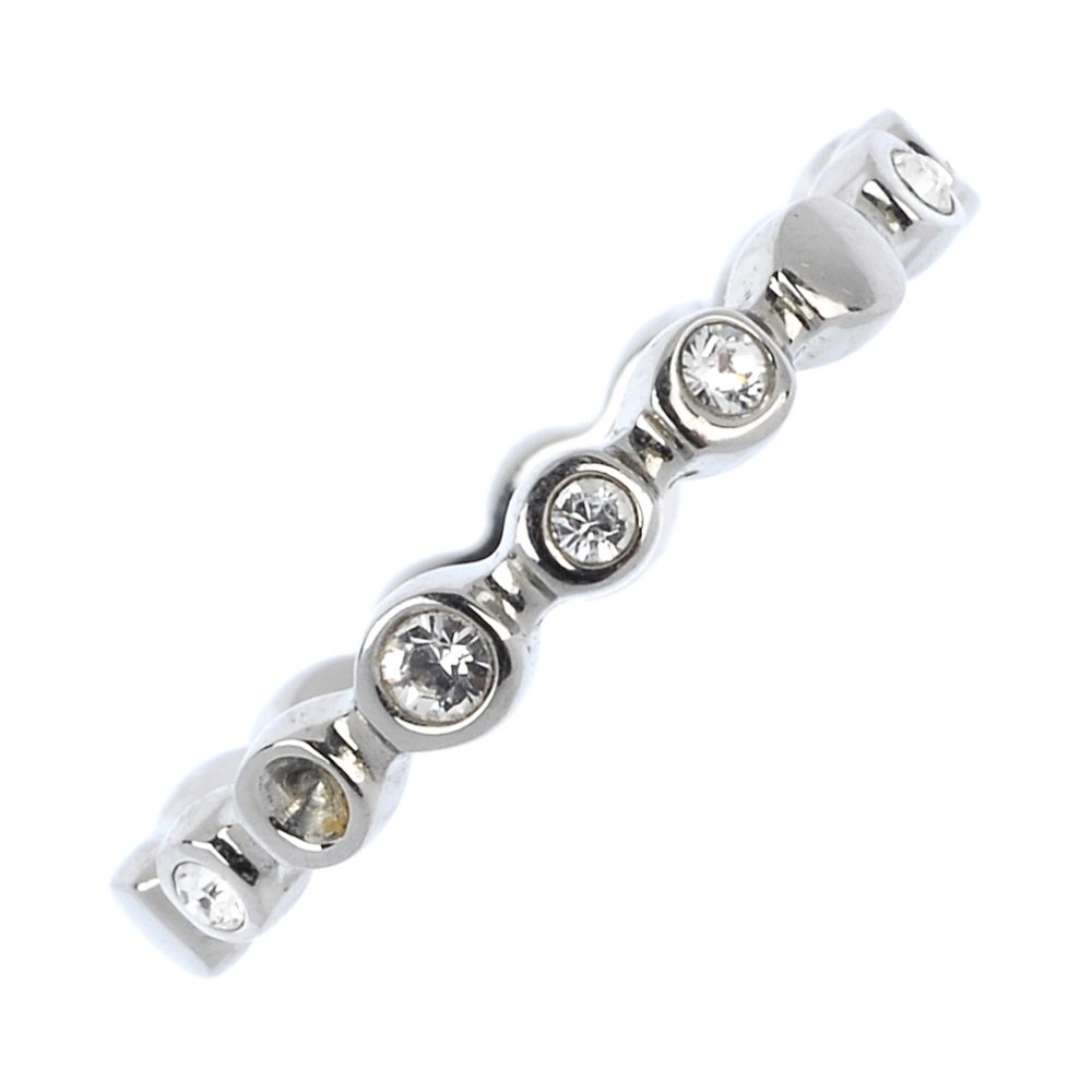 DKNY - a selection of jewellery.: * DKNY - a selection of jewellery. To include three heart-shape pendants of similar design, two bangles with cubic zirconia detail, together with further assorted jewellery. One with maker's case.